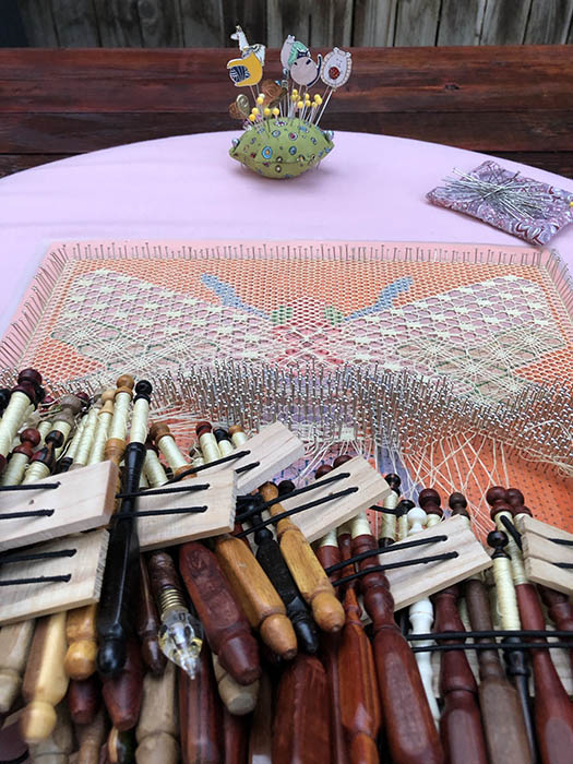 Bee bobbin lace project - Bee bobbin lace, bobbins, and a pin cushion with adorable divider pins. 