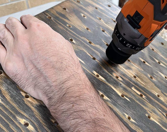 drilling holes into the wood