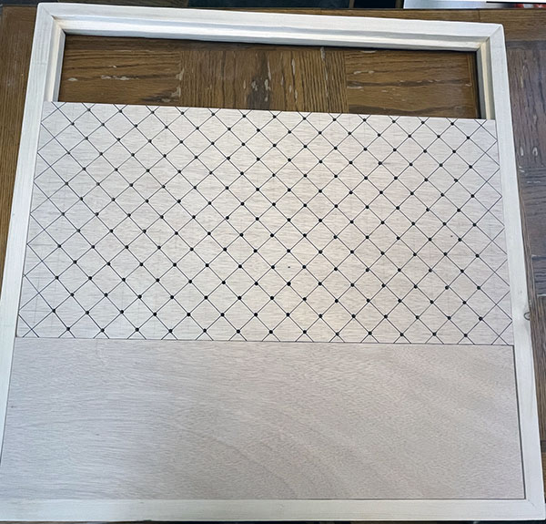 grid panel and blank spacer in a frame