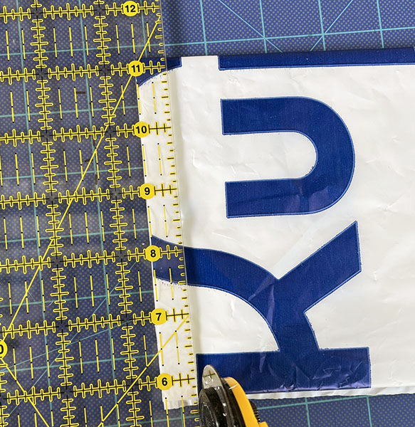 ruler to cut 1/2 inch strips from plastic bag