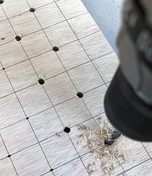 drilling holes into the wood