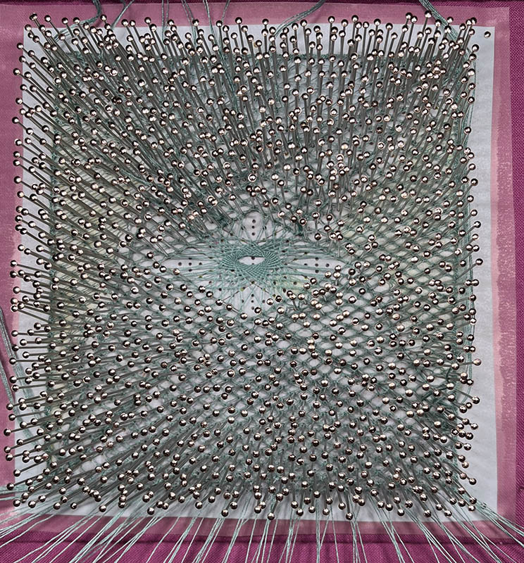 You know the triangle outline works, when you can see it past all the pins. 