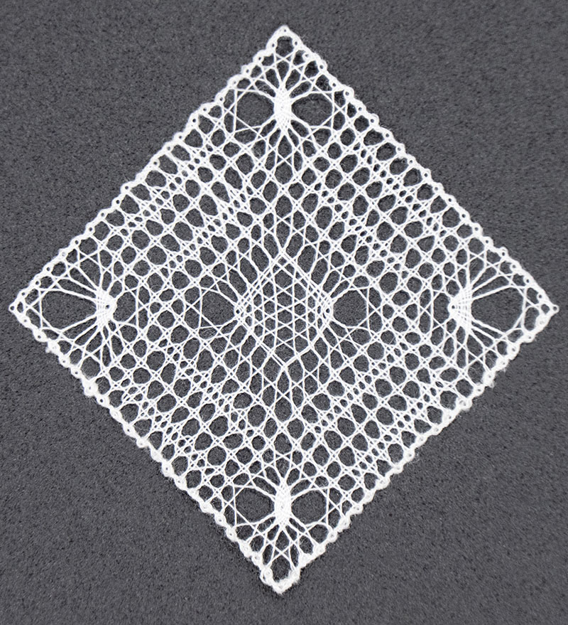 Detailed view of all the lace stitches in the finished piece. 