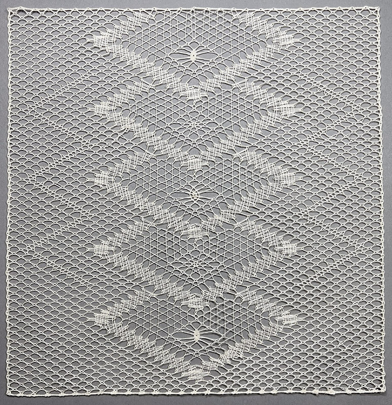 Completed Spectral Shift bobbin lace sampler in silk.